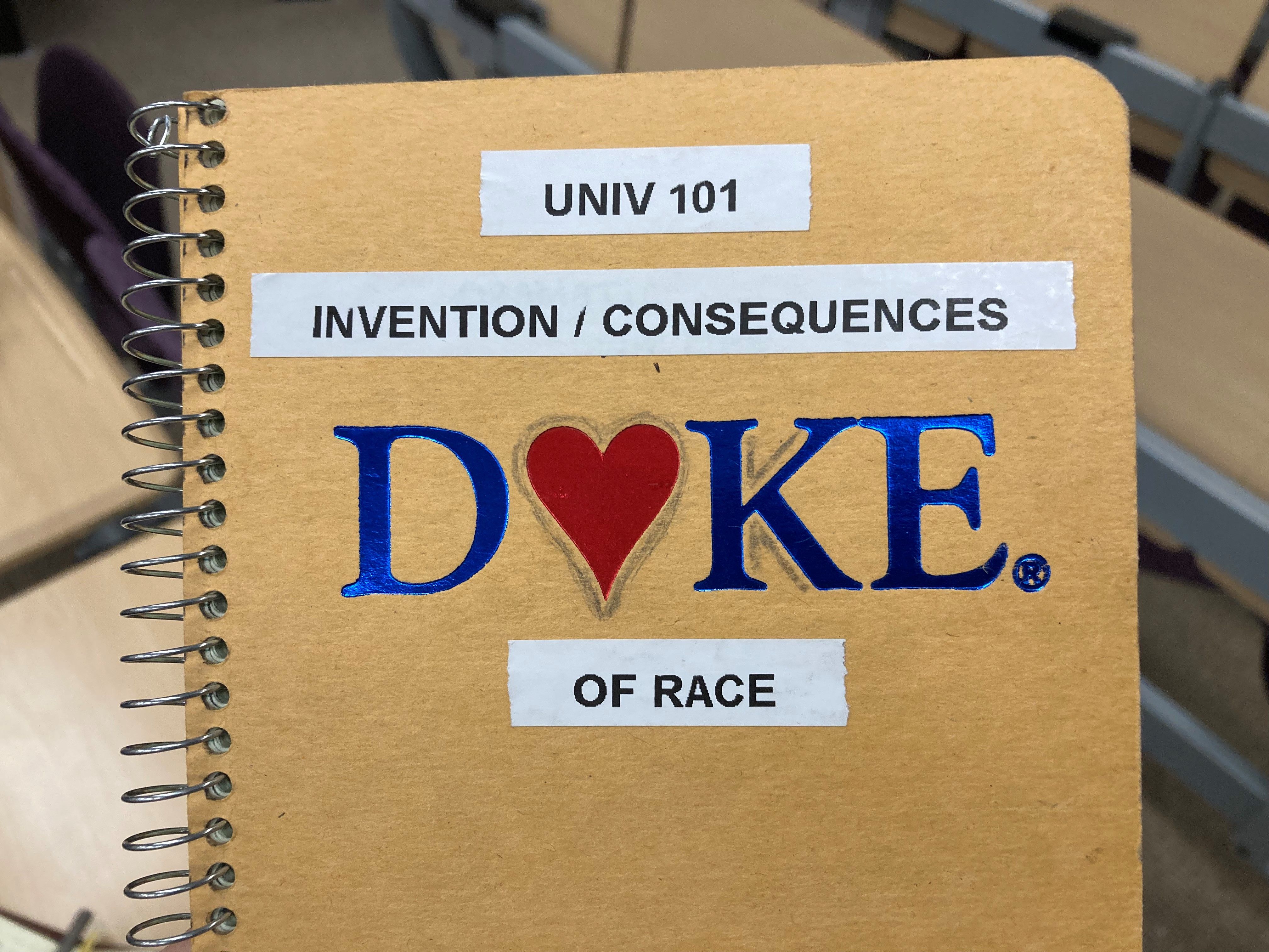 Notebook with duke sticker on the cover.