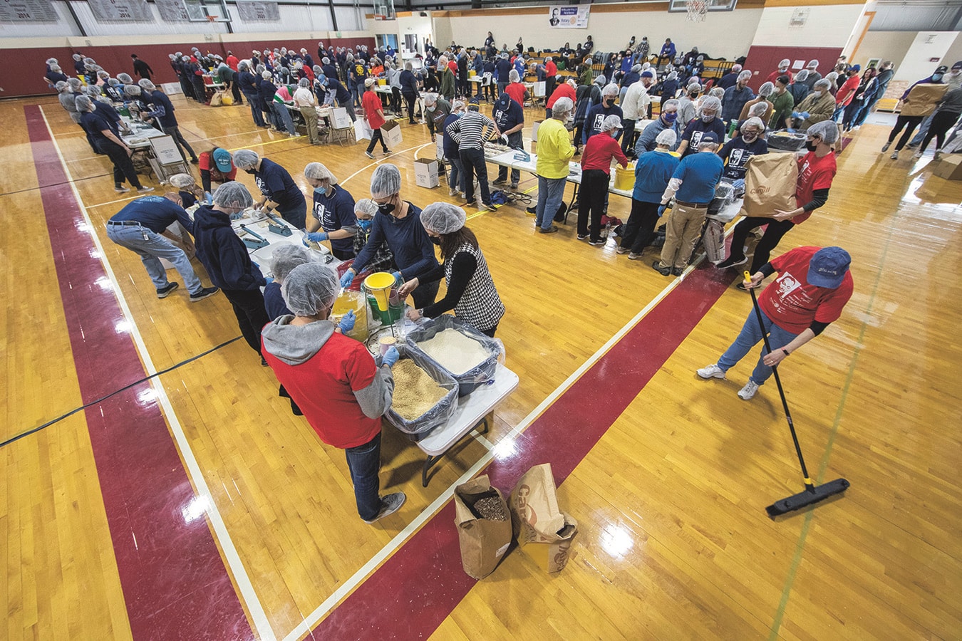 Duke volunteers pack lunches for underserved schoolchildren over the MLK weekend. Photo by Chris Hildreth