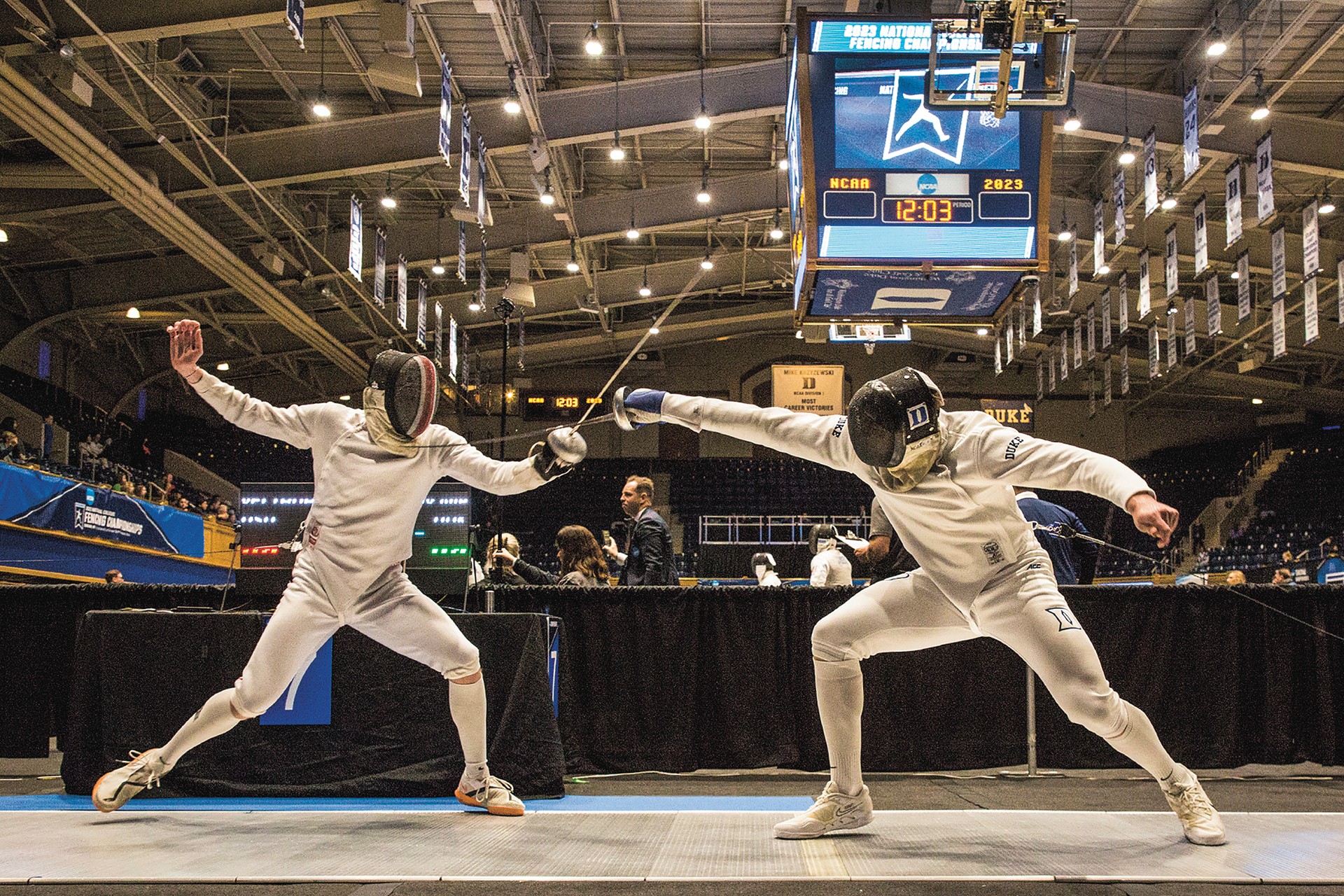 En garde — A bout unfolds at the NCAA Fencing Championships, held in March at Cameron Indoor Stadium. Duke’s team placed 9th in head coach Alex Beguinet’s 38th and final season.