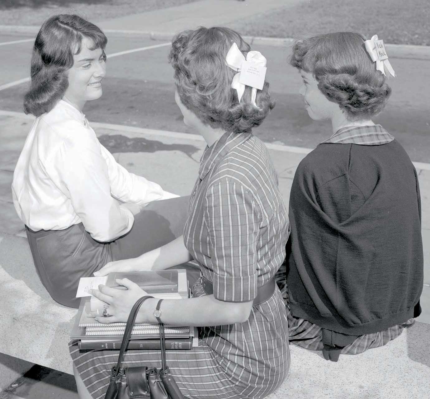 Young women wearing bows