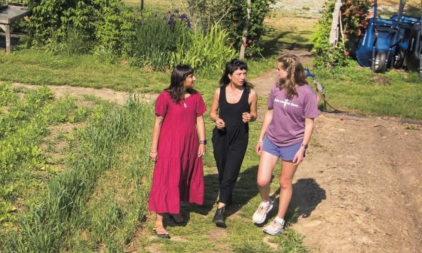 Duke Campus Farm Program Director Saskia Cornes (above, center) with students Gurnoor Majhail (left) and Adeline Geitner, and Senior Lecturer in Earth and Climate Sciences Alex Glass  were two Climate Change Faculty Fellows in 2022’s inaugural section of UNIV102: Let’s Talk About Climate Change