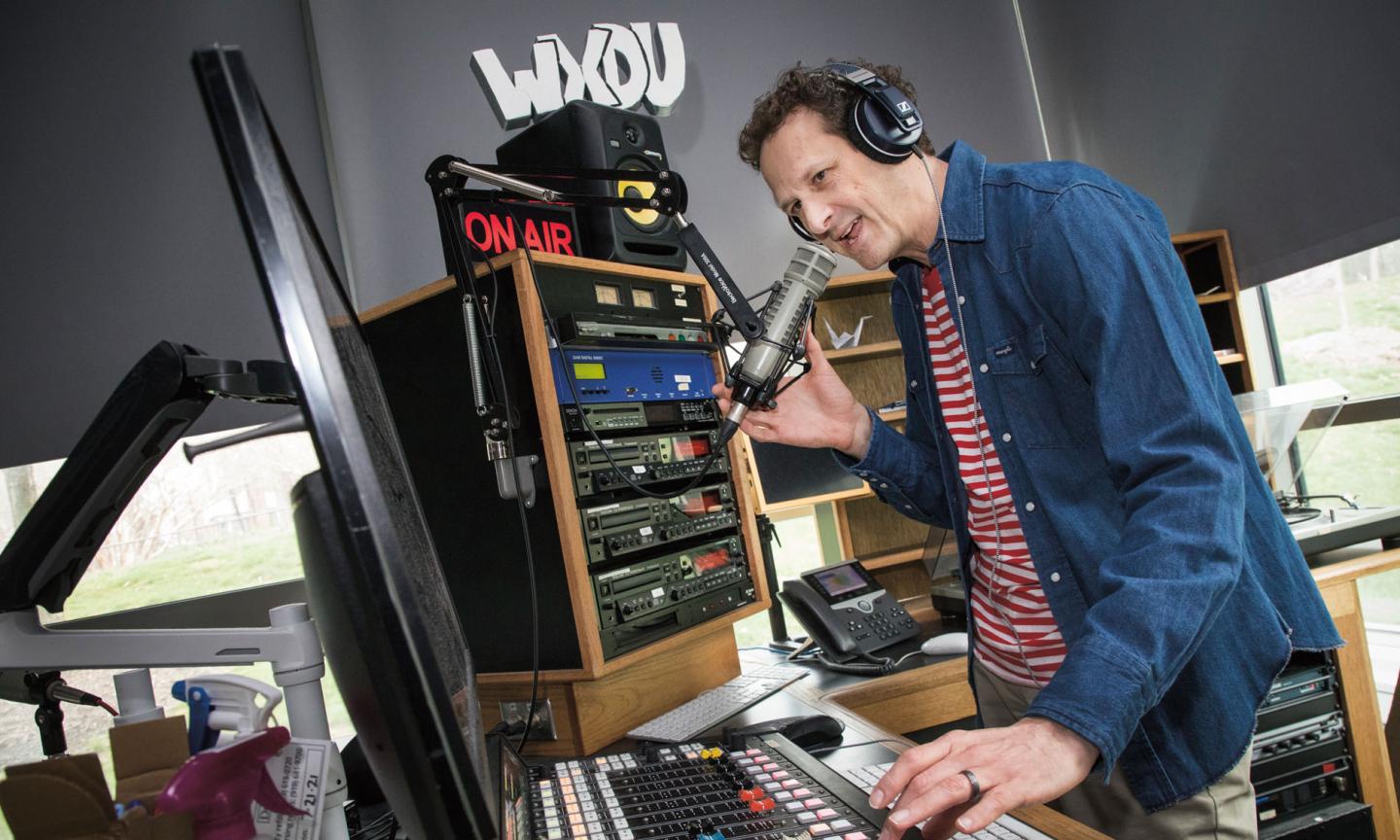 Photo of Gavin Yamey in radio studio