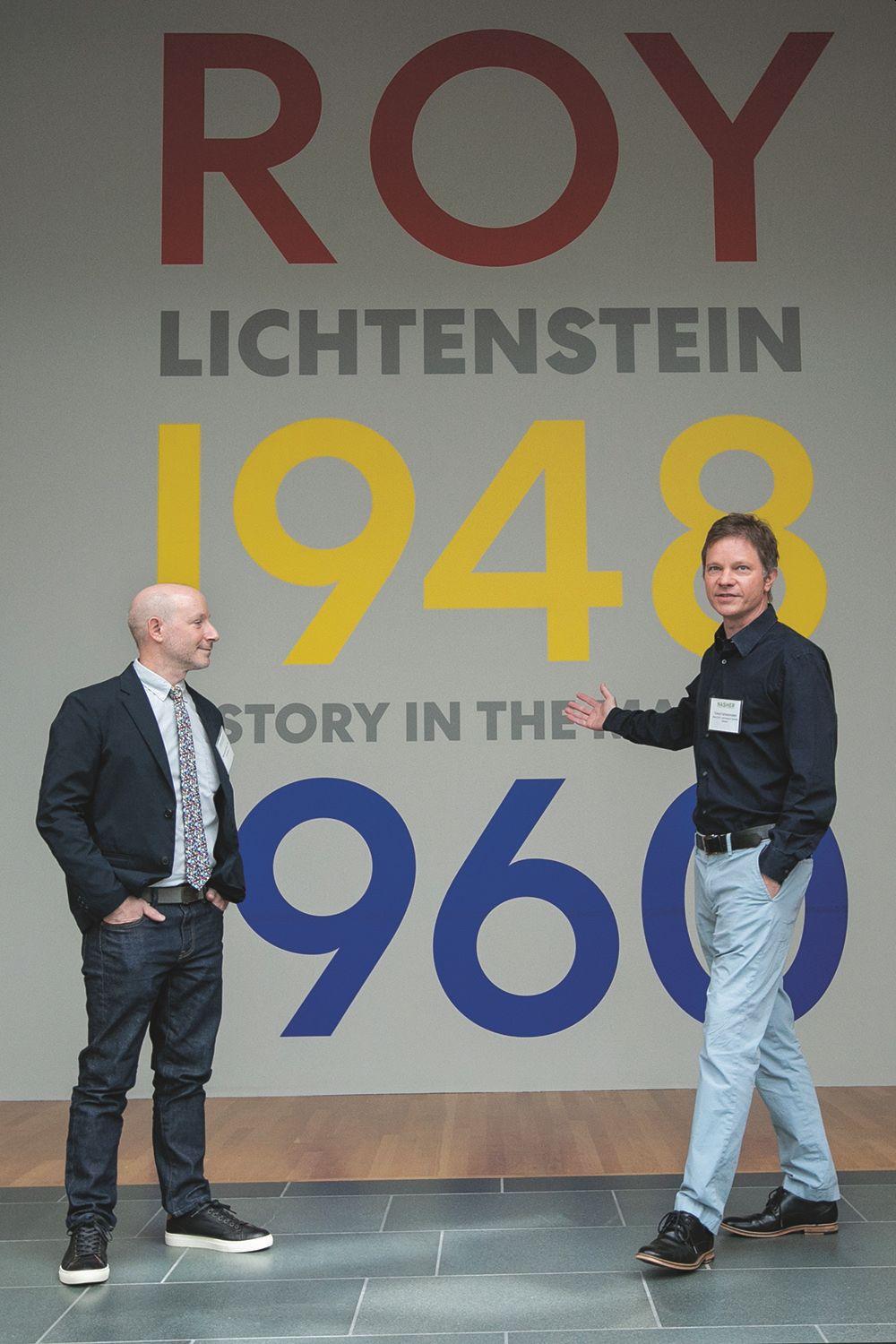 THUMBNAIL: Nasher co-curator Marshall N. Price and museum director Trevor Schoonmaker in front of a the Lichtenstein show artwork.